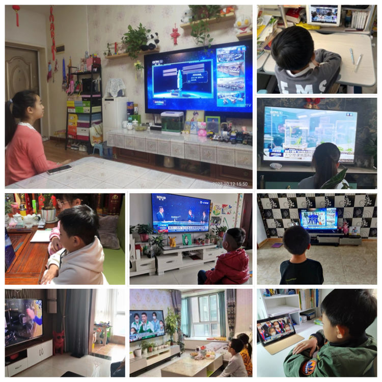图为学生认真观看直播